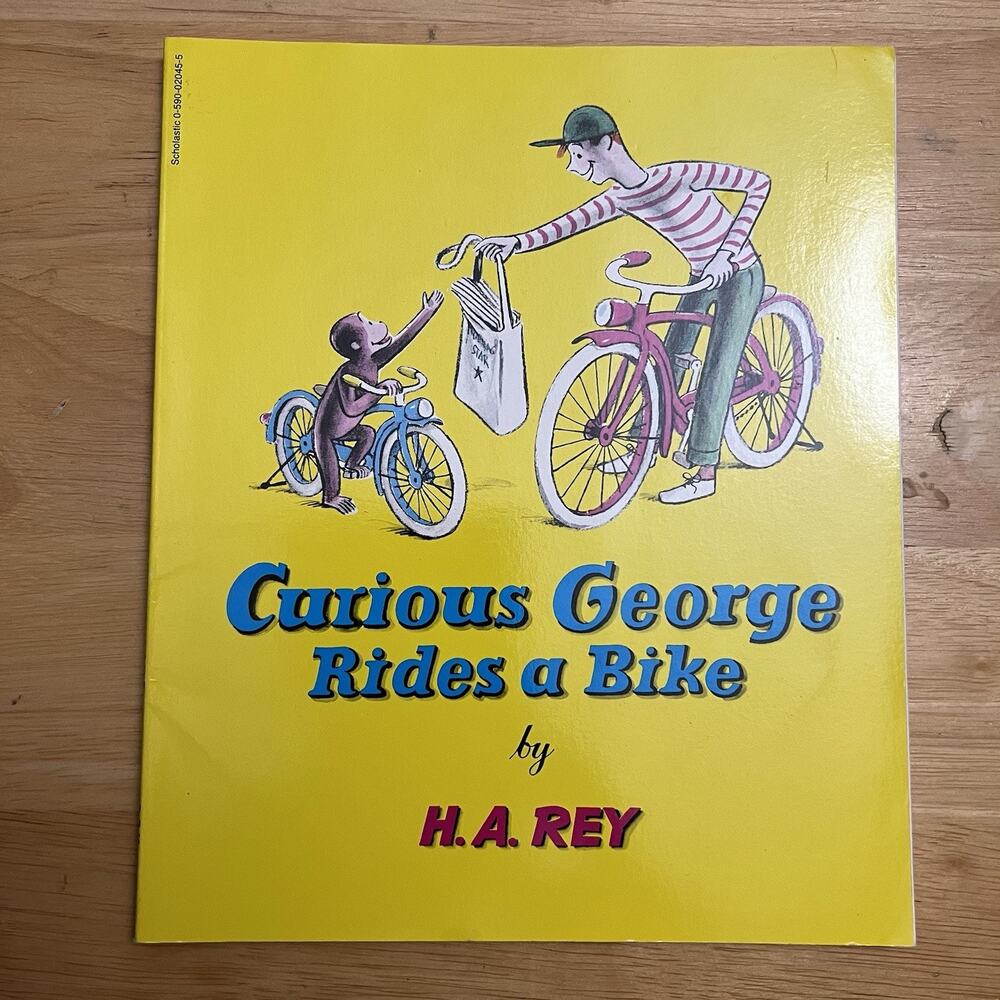 Curious George Rides a Bike by H A Rey Paperback Childrens Book